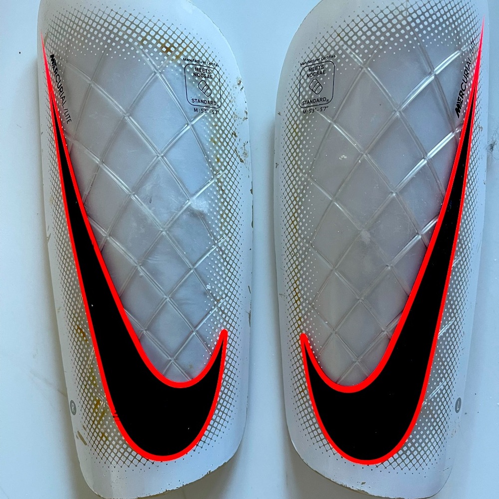 Nike Mercurial LITE shin guards.